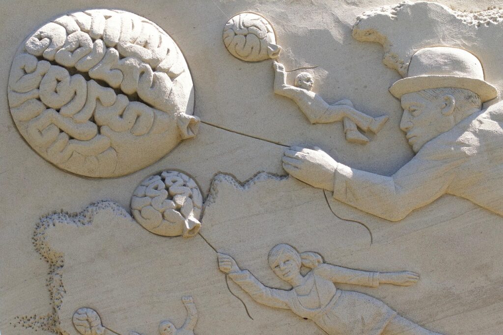 brain, balloon, man, cap, child, woman, sand sculpture, brain, brain, brain, brain, brain